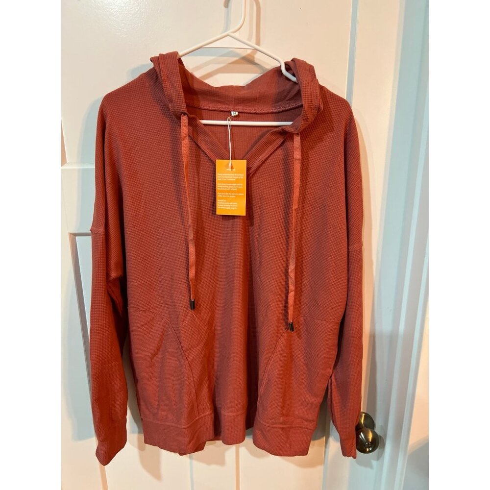 Boardwalk High Hip Hoodie in Canyon Orange.